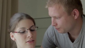 Cumshot alongside tattooed nerd in glasses